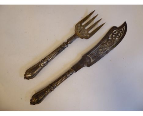 An early Victorian silver fish slice and fork with decoratively pierced ornament, on moulded handles&nbsp; George Adams&nbsp;