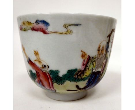 A 19thC Chinese porcelain footed tea bowl, decorated in famille rose with a sage and a boy at play&nbsp; bears a red seal mar