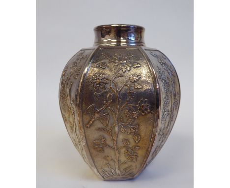 A late 19th/early 20thC Christoffel white metal tea caddy of hexagonal form with a cover, decorated in Chinese taste with cas