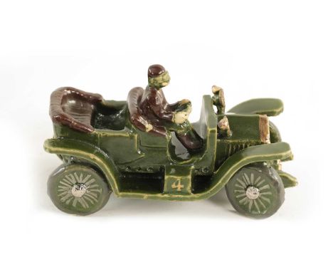A MODERN LIMITED EDITION CERAMIC MODEL OF A 1906 ROLLS ROYCE signed Julia and numbered 39/100 underneath.