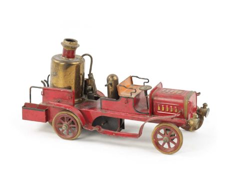 A LATE 20TH CENTURY PRESSED STEEL MUSICAL FIRE 'PUMPER' ENGINE TOY MODEL painted with a red ground and gilt highlights, artic