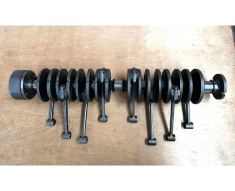 AN EIGHT CYLINDER CRANKSHAFT POSSIBLY OFF A BUGATTI89cm long