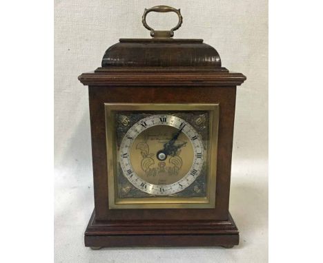 An Ellcot walnut effect 20th century Bracket style Mantel Clock, retailed by Garrard &amp; Co., London, gilt and silvered squ
