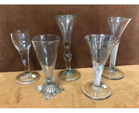 A collection of five 18th/19th century drinking glasses to include a 17cm wine glass, the knopped stem with teardrop, a 16.5c