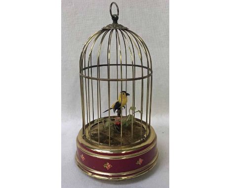 A Swiss Reuge Music St Croix reproduction Automaton  as a Singing Bird in a Gilded Cage, ring handle to top, painted base wit