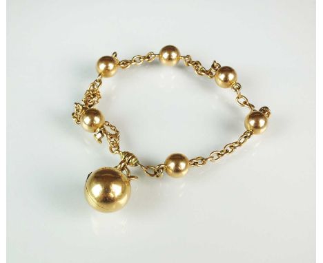 A yellow metal oval and orb link bracelet, with attached orb locket, not stamped, weight approx 17gCondition report: Clasp in