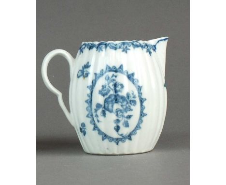 A Caughley 'Fruit and Wreath' cream jug, of ribbed barrel form with sparrow beak spout, printed C with serif mark, 8.5cm high