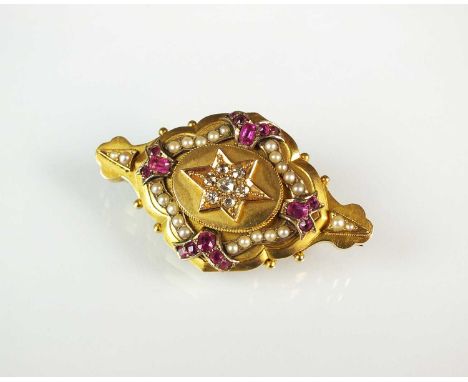 A late 19th century ruby, diamond and seed pearl locket brooch, designed as a central old cut diamond set star mounted within