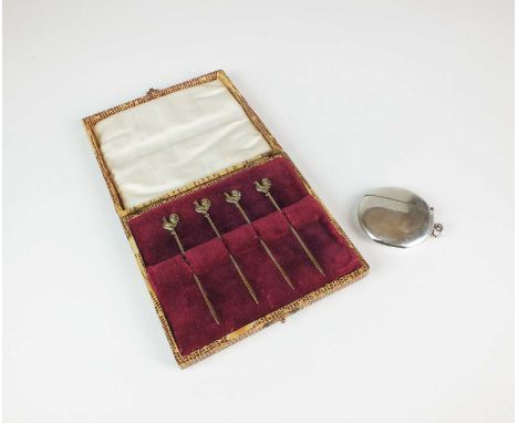 A cased set of four silver gilt cocktail sticks, Birmingham 1929, each with cockerel finial, together with a circular silver 