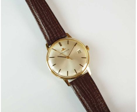 A Gentleman's 18ct gold Jaeger Le-Coultre wristwatch, manual wind, the circular silver dial with batons, sweep seconds hand a