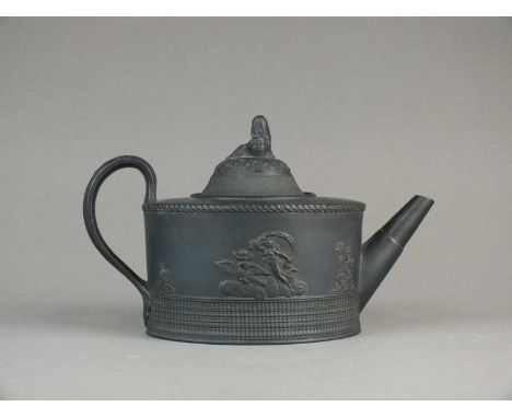 A rare Caughley black basalt teapot and covercirca 1780-90of straight-sided oval form, the cover with a finial modelled as a 