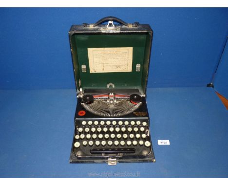 A small boxed Remington Portable Typewriter, in good condition.
