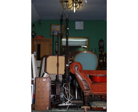 A dark Oak carved lamp stand.