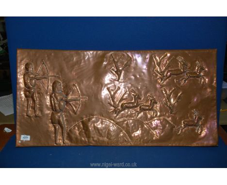 A large copper wall plaque with a hunting scene, 35'' x 17''.