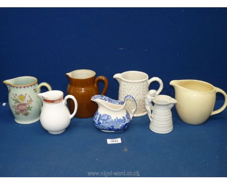 A quantity of jugs including Taunton Vale 'Corn Dolly', Copeland Spode, and Royal Worcester 'Beaufort'