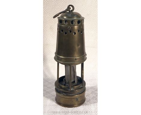 An early brass Miner's lamp, applied plaque marked 026.