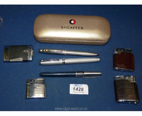 A Sheaffer roller ball pen and a biro plus one other, three vintage Ronson lighters and a vintage Maruman lighter.