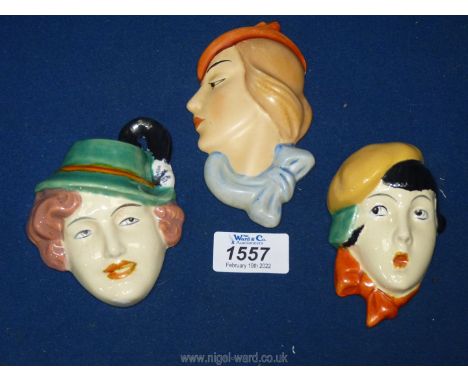 Three small Art Deco style wall plaques of ladies faces, one from Czechoslovakia (one with small chip)