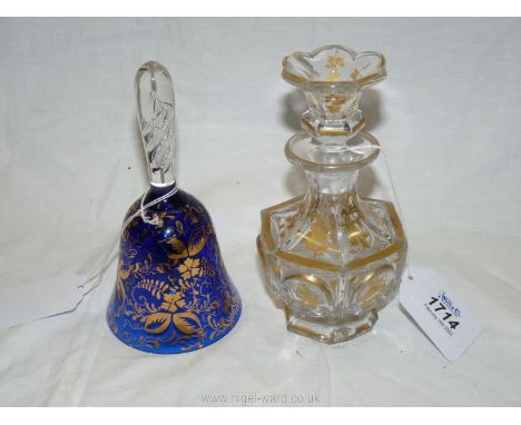 A Cobalt blue crystal glass bell with gilt decoration and clear handle with spiral twist, 6 1/4'' tall and a clear and gilt s