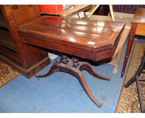 A good 19th c. Mahogany flap-over green baize lined Card Table having cross-banding to the top, raised on a pair of turned su