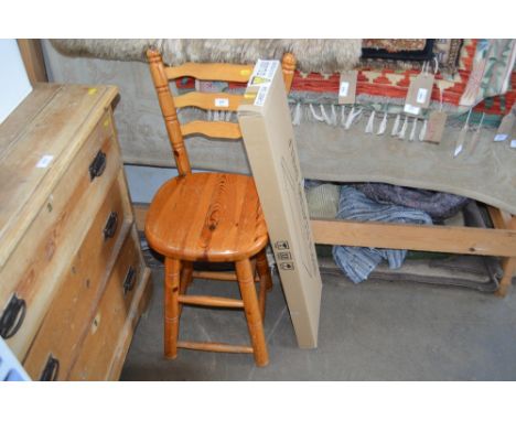 A maple floating shelf; together with a pine ladder back chair