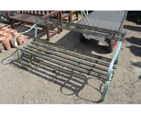 A wooden and metal garden bench