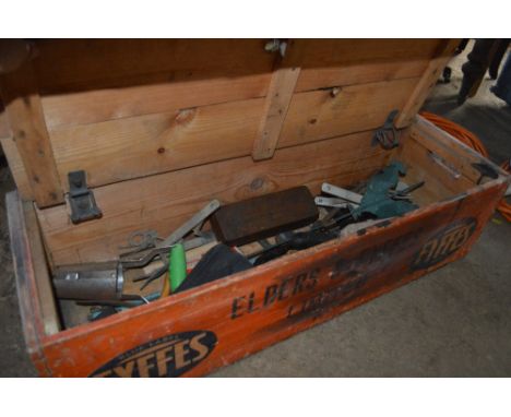 A wooden box and contents of various tools 