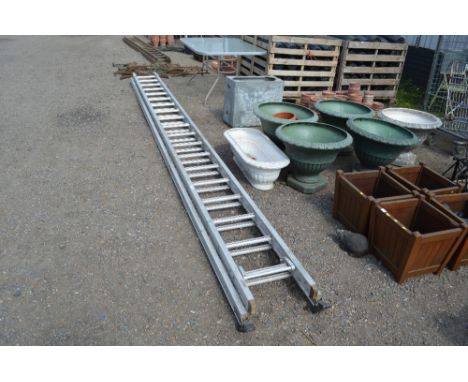 An extending aluminium ladder 