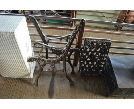 A pair of garden bench ends and back