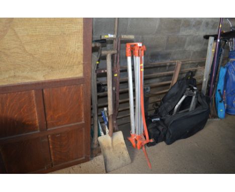 A quantity of long handled gardening tools 