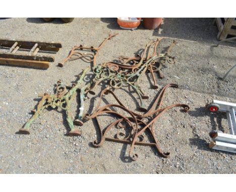 A quantity of metal bench ends