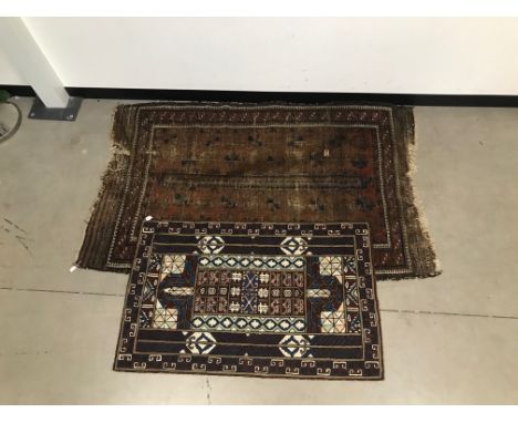 A vintage flatweave rug 122 cm by 77 cm,  together with a heavily worn middle eastern woollen carpet