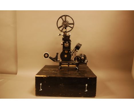 A first half 20th century Pathescope Super film projector, in homemade pine black painted box