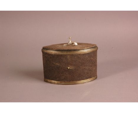 A Regency period nickel and shagreen caddy, 17cm wide, elliptical with ray skin and having greyhound to lid, misshapen