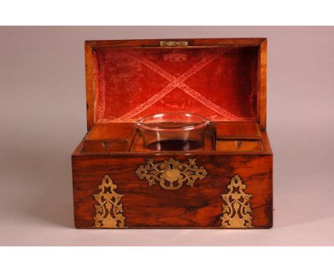 A Victorian rosewood tea caddy from Austin Westmoreland St Dublin, 31cm wide, domed lid with brass straps and escutcheon, two