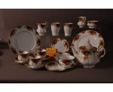 A second half century Royal Albert porcelain Country Rose pattern tea and dinner ware, including 6 dinner plates, 10 side pla