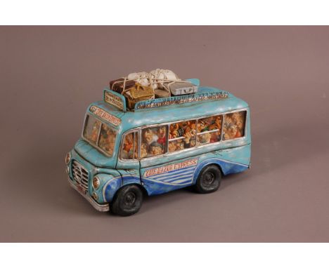 A modern ceramic comical sculpture of a tourist bus by Guillermo Forchin, 31cm long, chipped, titled Cote D'Azur Espress