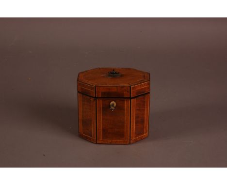 A George III mixed wood tea caddy, octagonal form, later lined, 10cm high and 12cm, with key