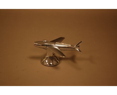 A mid 20th Century Dunhill lighter in the form of a 'Sabre' USA fighter jet, 16cm wide, with nose cone activating cigarette l