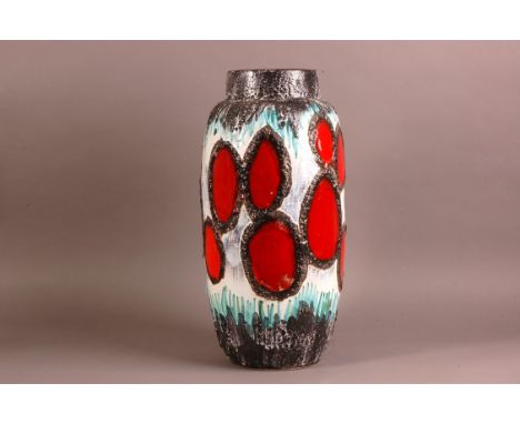A c1960s West German pottery vase, 52cm, with red spots on white, black and light blue ground
