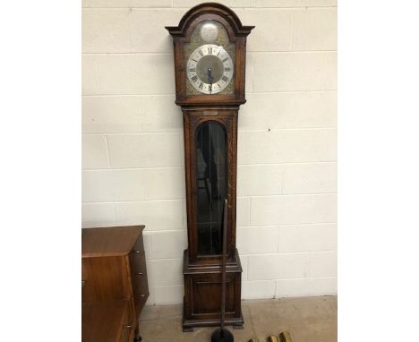 20th Century oak cased longcase clock, the brass dial bearing the inscription Tempora Fecit, with brass weights and pendulum,