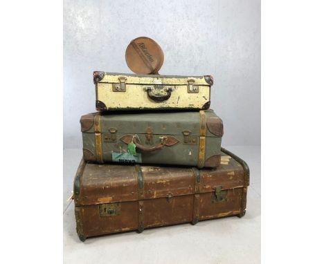 Two vintage suitcases, the larger approx 69cm x 44cm x 25cm, a vintage metal bound trunk and a small circular leather box