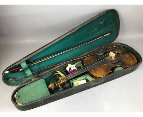 Vintage cased violin marked Stainer, with two bows, one with mother of pearl inlay (A/F)