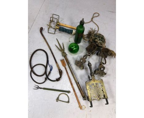 Collection of vintage items to include whip, roller skates, metal and glass ware