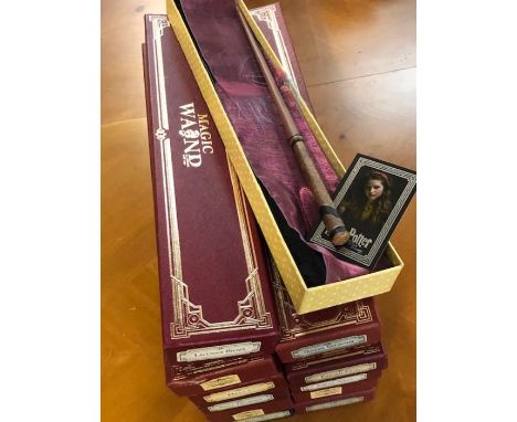 HARRY POTTER: Eleven boxed collectable magic wands to include Draco Malfoy, Bella, Ginny Weasley etc