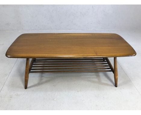 Ercol 'Golden Dawn' coffee table with shelf under on turned legs, approx 104cm x 46cm x 37cm tall