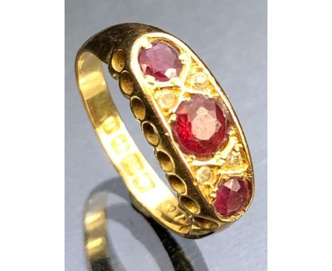 Antique 18ct Gold Ruby and Diamond ring, three Rubies and four diamonds in a pierced setting size 'L'