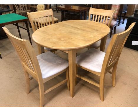 Light wood kitchen extendable table and four suede padded chairs, table approx 105cm x 80cm (unextended)