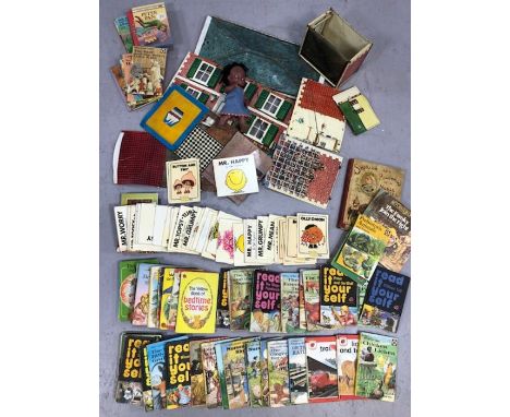 Collection of vintage children's toys and books