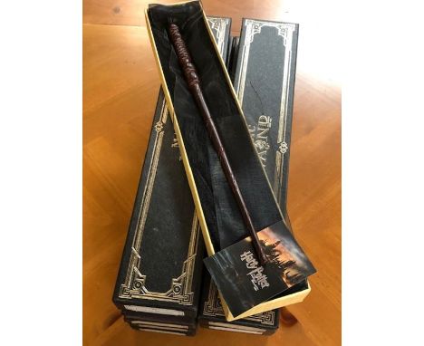 HARRY POTTER: Nine boxed collectable magic wands to include Fred Weasley, Neville, Percy Weasley etc